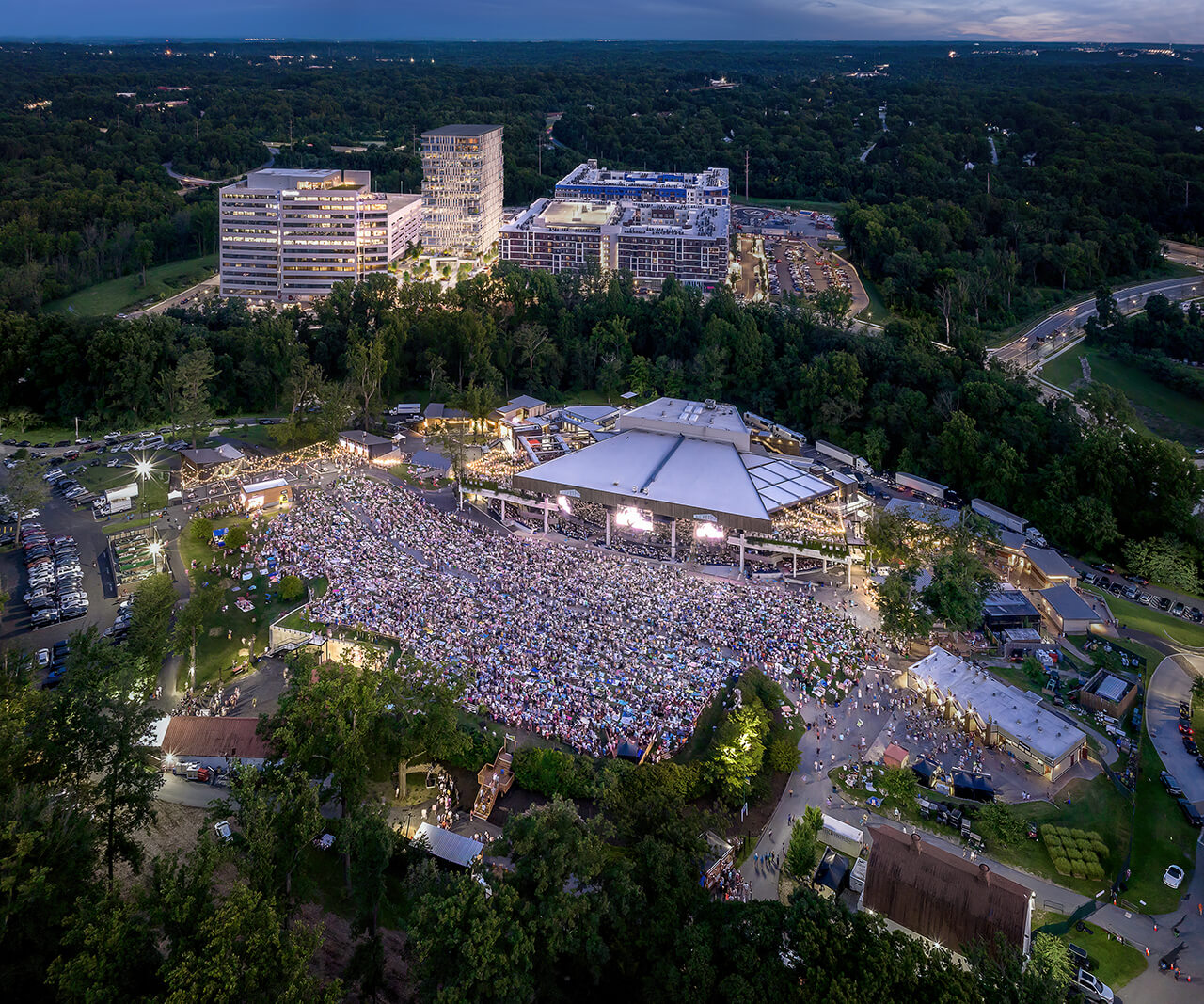 Outdoor event with 6300 Merriweather in the background.